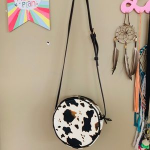 Round cow print crossbody bag!